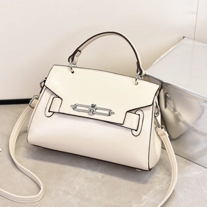 Cream white faux leather crossbody bag with silver metal lock and top handle