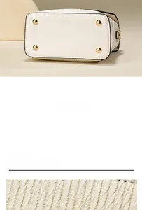 Détails du fond du sac en cuir blanc avec pieds dorés et texture de tissu tissé blanc