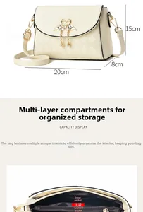 Detail view of cream leather crossbody bag size 20x15x8cm with internal storage pockets