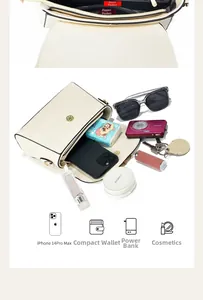 Internal view of beige quilted shoulder bag showing compartments and daily essentials capacity