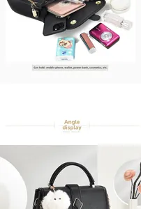 Détails du sac noir en cuir grainé avec fermoir doré, pompon blanc et rangement intérieur