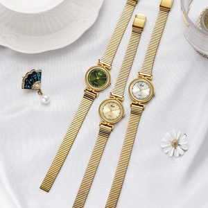 Elegante Vintage-Quarzuhr für Damen mit goldenem Netzarmband und smaragdgrünem Zifferblatt