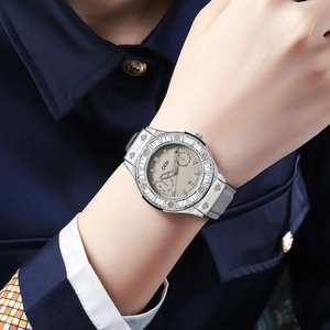 GEDI Morandi grey quartz watch with zircon bezel and grey strap on female wrist