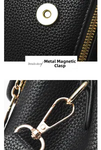 Détails macro d'un sac en cuir noir avec boucle magnétique dorée et crochets en métal