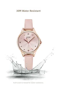 Detailed view of 3ATM waterproof rose gold watch with pink leather strap and dial