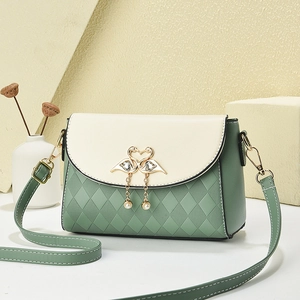 Minimalist colorblock crossbody bag with quilted morandi green texture and swan clasp