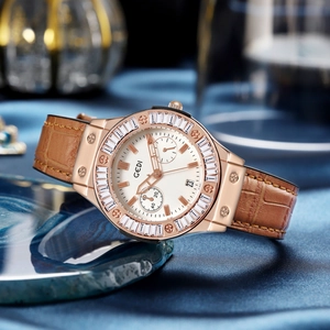 Rose gold quartz watch for women with rhinestone bezel and brown leather strap