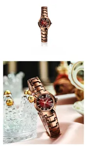 Détail de montre femme GEDI avec cadran rouge et index strass sur support couronne