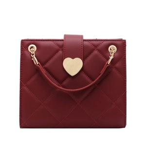 Elegant burgundy quilted tote bag with golden heart lock and chain strap for women
