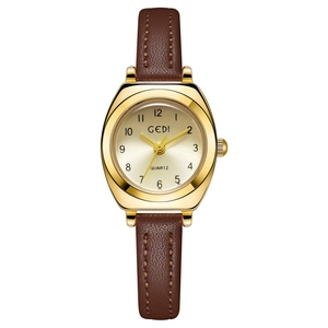 Montre vintage GEDI pour femme à quartz avec boîtier doré et bracelet en cuir brun