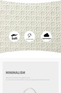 Detail of white woven leather texture showing soft, lightweight material on crossbody bag