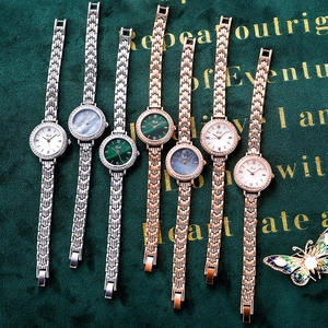 Luxury Gedi women watch set with round diamond bezels and elegant alloy chain bracelets