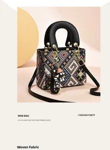 Mini handbag with geometric woven fabric, round leather handle and cartoon charm detail