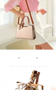 Crocodile pattern beige handbag with brown handles and a silk scarf detail