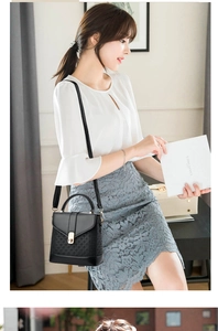 Structured black handbag with geometric textured leather and metal clasp detail for women