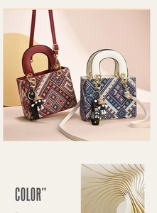 Detail of canvas handbags with geometric embroidery, leather handles and cute charms