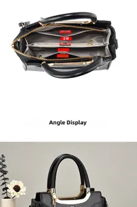 Top view of black leather handbag interior showing five functional compartments with lining