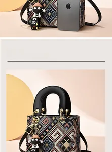 Macro detail of geometric tweed handbag featuring leather handle and MICE doll charm