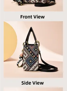 Vertical view of mini canvas crossbody bag with ethnic geometric weave and leather straps