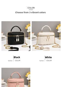Detailansicht gesteppter Mini-Box-Taschen in Schwarz und Weiß mit goldenen Ketten