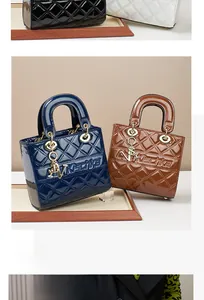 Detail view of quilted patent leather handbags in four colors with metallic letter charms