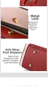 Detail of glossy hardware clasp and bottom metal studs on red leather handbag
