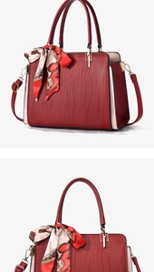 Detailed texture of red embossed water ripple leather with printed silk scarf handle