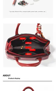 Detail view of red handbag interior showing multi-compartment functional layout and capacity