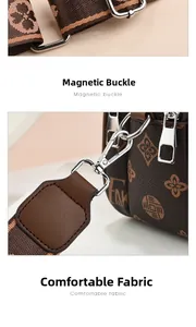 Détails de la bandoulière large réglable et des ferrures métalliques du sac vintage
