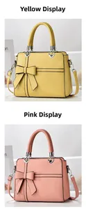 Detail of pink and yellow bow handbags featuring heart-shaped metal buckles and straps