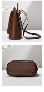 Détail d'un sac à dos en cuir marron foncé montrant le fond avec pieds en métal et le côté