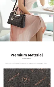 Detail showing high-quality dark coffee PU leather with lychee texture and heart charm