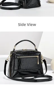 Seiten- und Frontalansicht der schwarzen Kroko-Lacktasche mit goldenen Beschlägen