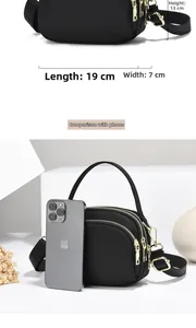 Sac bandoulière en nylon noir à trois couches, 19x7x13 cm, comparé à un iPhone