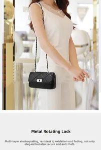 Detail of black quilted leather bag with silver chain strap and metal swivel lock