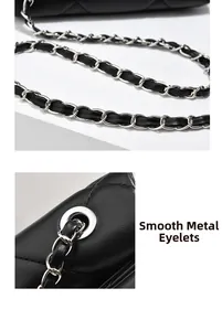 Macro shot of silver chain strap and metal eyelets on black quilted leather mini bag