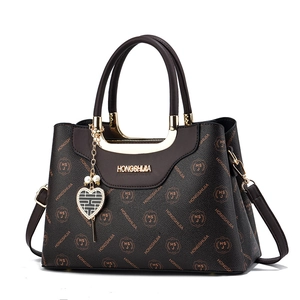 Retro large-capacity brown printed leather handbag with gold hardware and shoulder strap