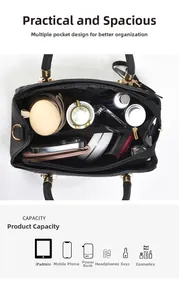 Internal view of large capacity black leather tote showing multiple storage compartments