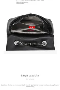 Detail view of the interior layout with multiple compartments in a black quilted bag