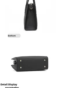 Detail of black saffiano leather bag bottom with golden metal feet and side view profile