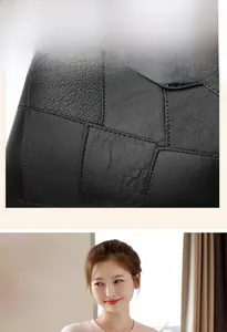 Detailed close-up of geometric patchwork and lychee pattern leather on black handbag