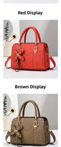 Detail view of red and brown quilted leather handbags with decorative butterfly charms