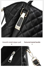 Detail of black quilted leather handbag with smooth gold zippers and metal clasps
