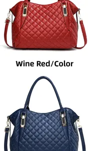 Detail of burgundy and navy blue quilted tote bags with metal hooks and matte leather