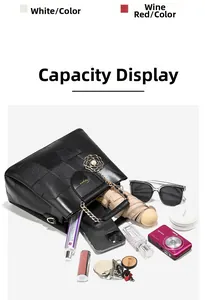 Spacious black woven leather handbag showing interior storage for phone and accessories