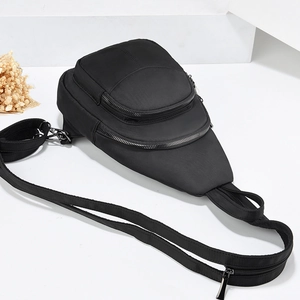 Minimalist black oxford fabric crossbody chest bag with multi-layer zipper compartments