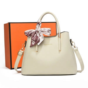 Elegant beige lychee grain leather tote bag with printed silk scarf and gold hardware