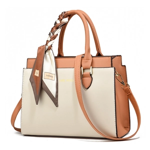 Minimalist beige and caramel tote bag with decorative silk scarf and crossbody strap