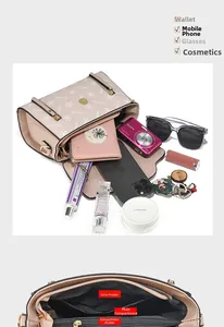 Detail view of large storage capacity showing interior compartments for phone and camera