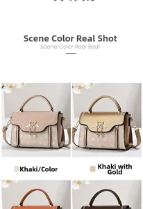 Detail view of khaki crossbody bag featuring heart swan buckle and logo pattern
